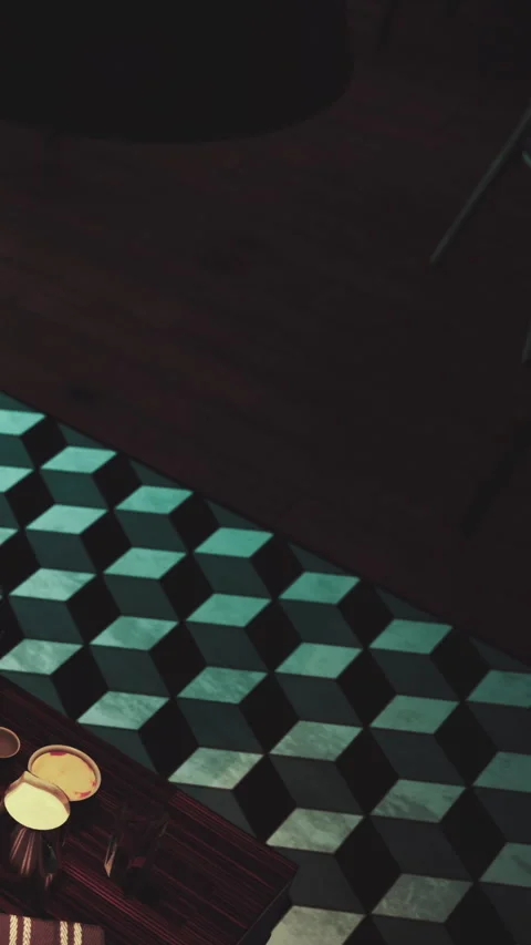 Colorful geometric floor design with a table setup and two drinks Stock Footage 338349435