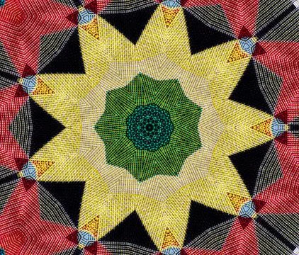 Colorful geometric pattern creating abstract kaleidoscope design Stock Photos