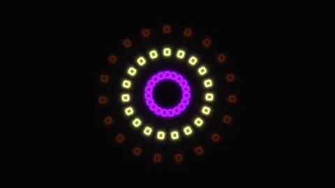 Colorful geometric pattern spins on a dark background Stock Footage 338244638