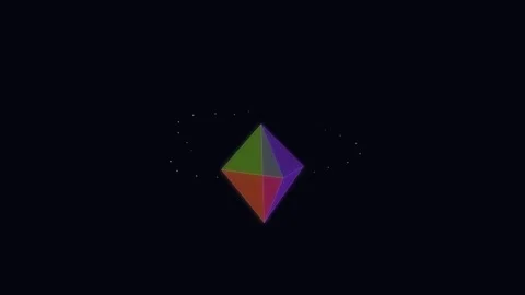 A colorful geometric prism shape floating against a stark black background Video stock 335118066