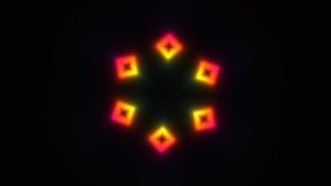 Colorful geometric shapes form a pattern on a dark Stock Footage 338010653