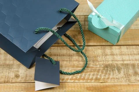 Colorful gift packaging on rustic boards Foto stock