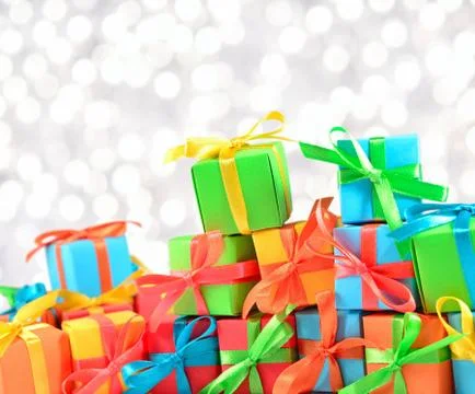 Colorful gifts on a bokeh background Stock Photos