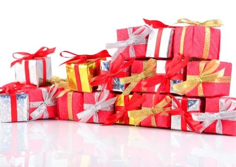 Colorful gifts close-up on a white background Stock Photos