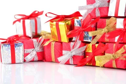 Colorful gifts close-up on a white Stock Photos