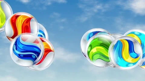 Colorful Glass Marbles Bouncing and Floating Against a Blue Sky 動画素材 344833264