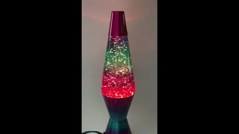 Colorful glitter lamp in motion Stock Footage 328880865