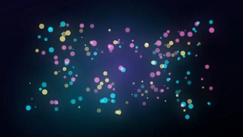 Colorful glowing bokeh particles floating on a dark background Stock Footage 335862706
