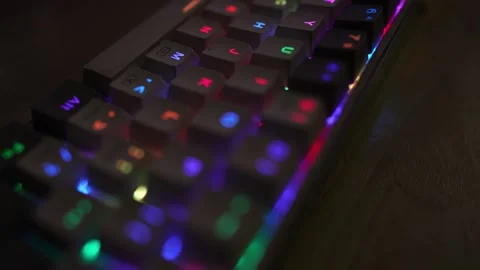 Colorful glowing computer mechanical keyboard viewing footage Stock Footage 290944512
