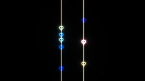 Colorful glowing hearts on strings in a dark background Video stock 339339576
