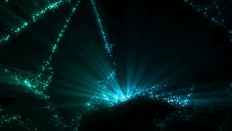 Colorful Glowing Particles Background Loop Stock Footage 204007344