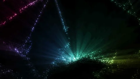 Colorful Glowing Particles Background Loop Stock Footage 204010140