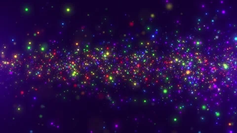 Colorful glowing particles floating on a dark purple background Stock Footage 312814733