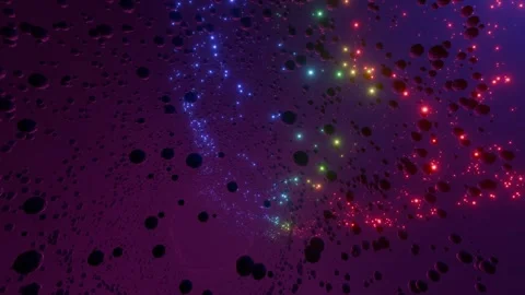 Colorful Glowing Particles Orbiting Dark Spheres Stock Footage 308380984
