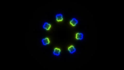 Colorful glowing shapes form a circle against a dark Stock Footage 338230822