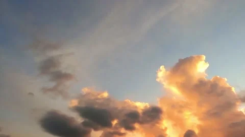 Colorful golden yellow cloudscape on dramatic sunset cyan blue sky Video stock 156795479