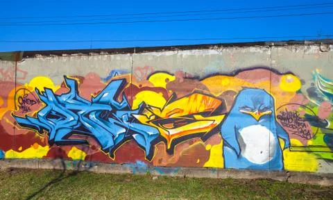 Colorful graffiti with text elements and angry penguin Stock Photos
