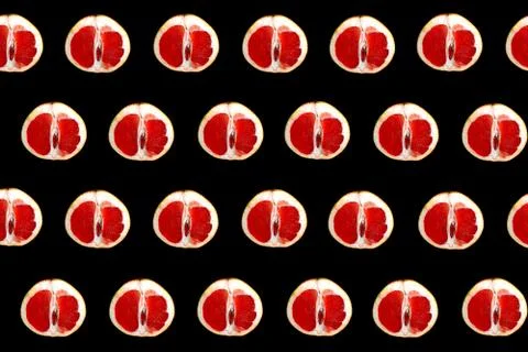 Colorful grapefruit pattern on black background top view Foto stock