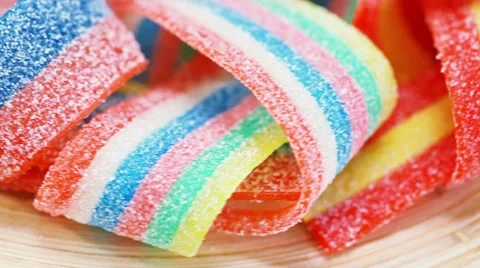 Colorful gummy candy rotating sweets background Stock Footage