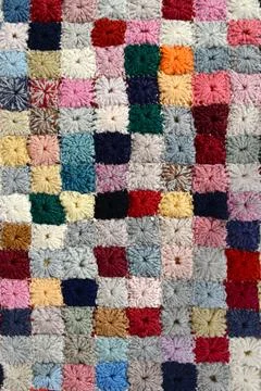 Colorful handcrafted patchwork quilt Stock Photos