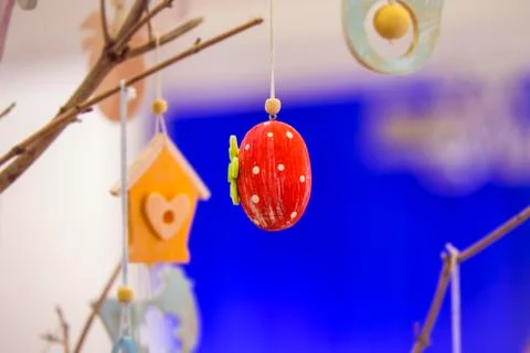 Colorful handmade wooden Easter elements: eggs, rabbits, chick. Easter bright Stock Photos