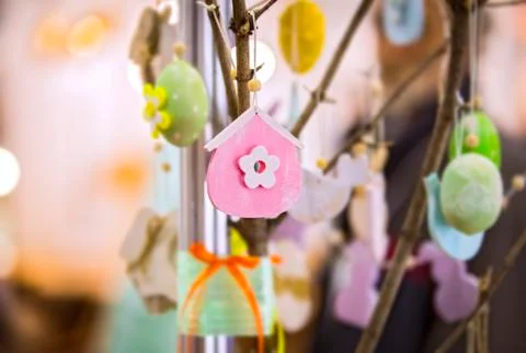Colorful handmade wooden Easter elements: eggs, rabbits, chick. Easter bright Stock Photos