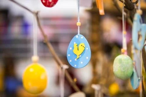 Colorful handmade wooden Easter elements: eggs, rabbits, chick. Easter bright Stock Photos