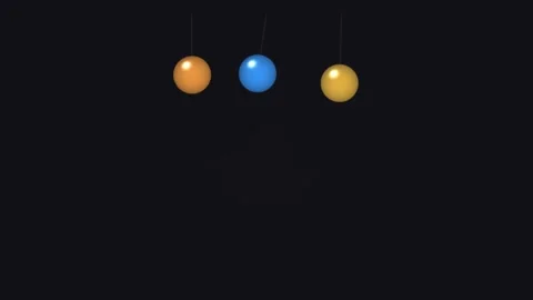 Colorful hanging spheres on string against black background Stock Footage 338232832
