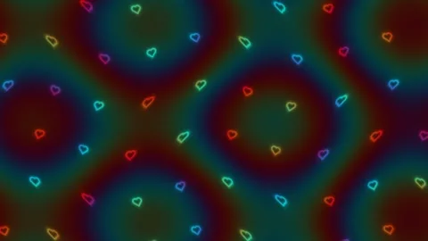 Colorful heart pattern on a dark background with glowing 스톡 동영상 338345601