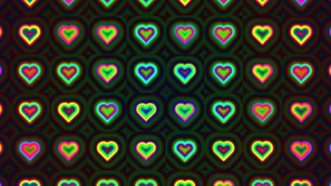 Colorful heart patterns on a dark background create a Stock Footage 338015326