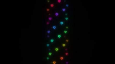 Colorful heart patterns on a dark background create a Stock Footage 338226131