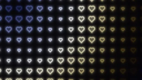 Colorful heart patterns fill the background with soft Stock Footage 338235319