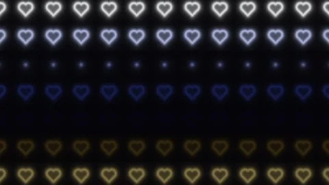 Colorful heart patterns with glowing effects in dark Stock Footage 338317101