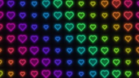 Colorful heart patterns shine on a dark background Stock Footage 338120977