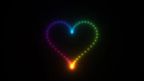 Colorful heart shape made with dots and lights on dark Stock Footage 338130982