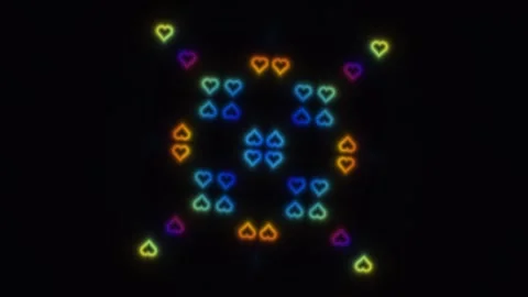 Colorful heart shapes arranged in a pattern on a dark Stock Footage 338277573