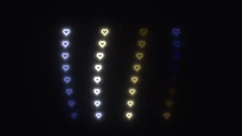 Colorful heart shapes create a bright pattern in dark space Stock Footage 338132545