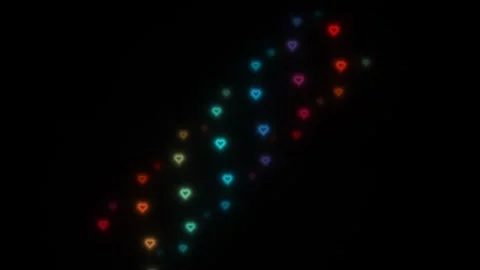 Colorful heart shapes create a pattern on a dark background Stock Footage 338277396