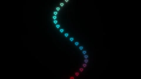 Colorful heart shapes in a flowing pattern on a dark Stock Footage 338287360