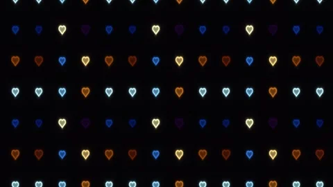 Colorful heart shapes in a grid pattern on a dark Stock Footage 338187505