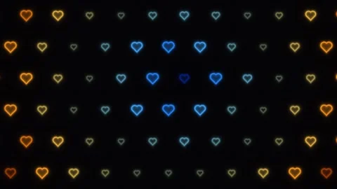 Colorful heart shapes moving in a pattern on a dark 库存影片 338318173