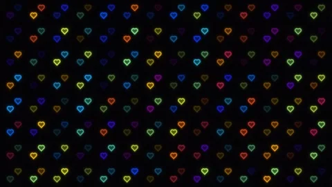 Colorful heart shapes in a pattern on a dark background Stock Footage 338202720