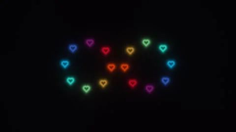 Colorful hearts arranged in a pattern on a dark background Video stock 338227264