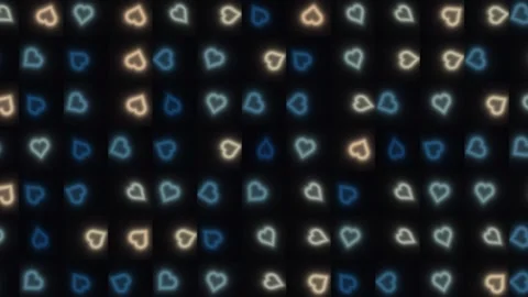 Colorful hearts on dark background create a playful pattern Stock Footage 338317467