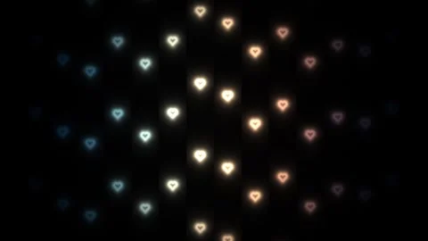 Colorful hearts in a dark background create a festive Stock Footage 338355843