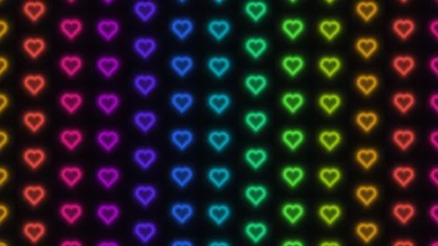 Colorful hearts displayed in a pattern on a dark background Stock Footage 338168857