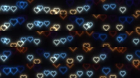 Colorful hearts float on a dark background, adding vibrancy Stock Footage 338034714
