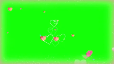 Colorful hearts float on green background festive animation Stock Footage 338216158