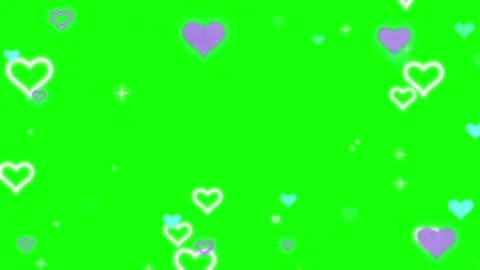 Colorful hearts float on green background with sparkles Stock Footage 338216176