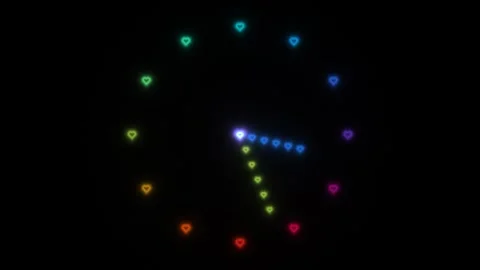 Colorful hearts form a clock in dark background Stock Footage 338332685